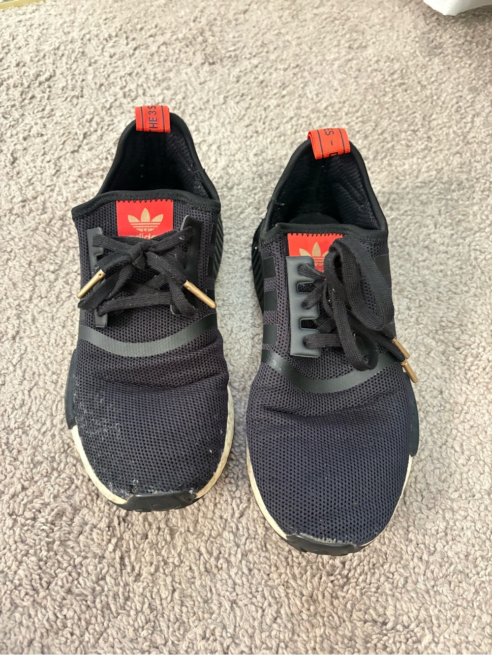 Adidas Boost Nmd Boys’s Black Athletic Sneakers with bright orange Accents